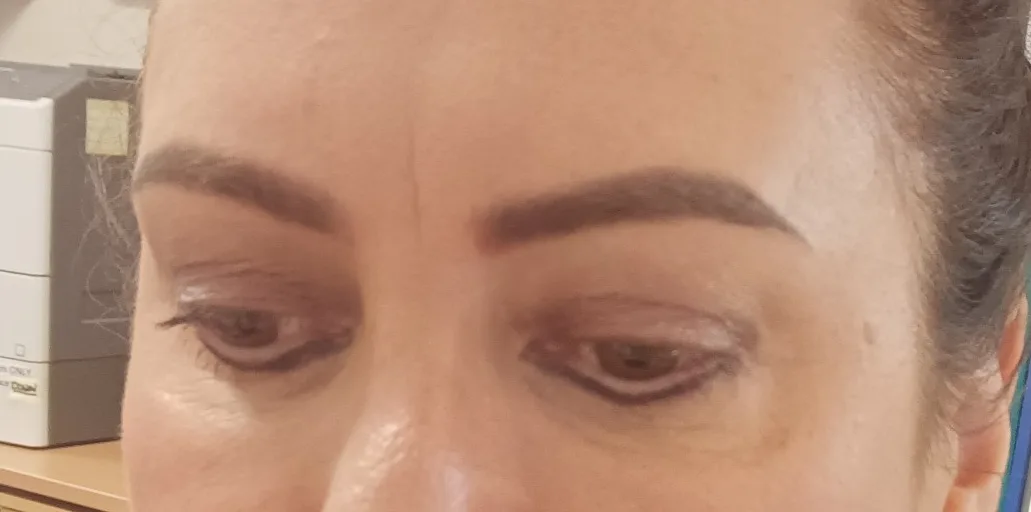 Healed eyeliner and brow tattoo — both eyes, defined lash line and full brow