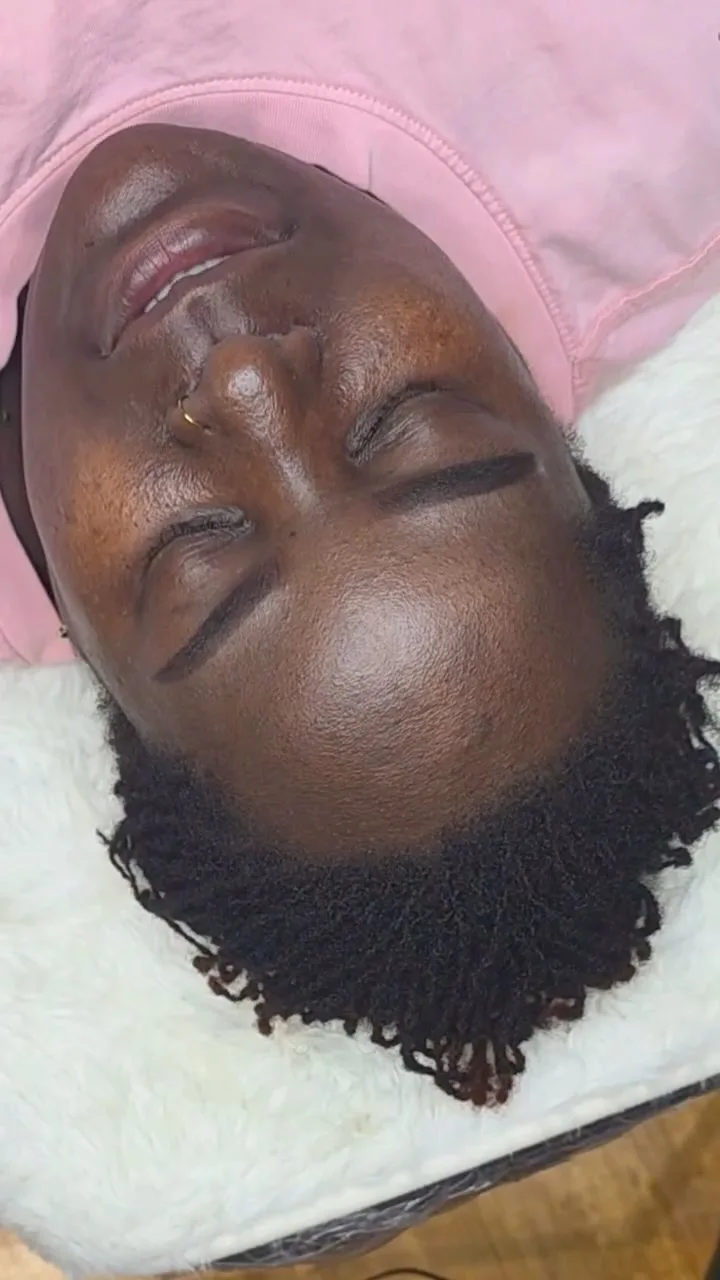 Finished natural brow tattoo result on reclined client